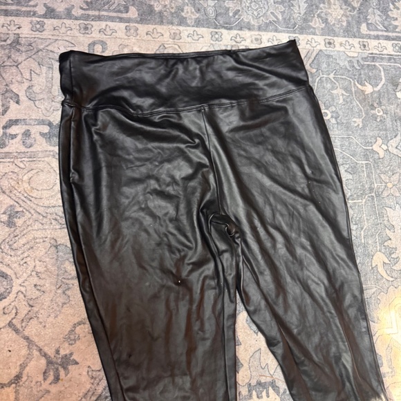 Sleek black faux leather leggings. Perfect for a chic look. - Picture 3 of 6